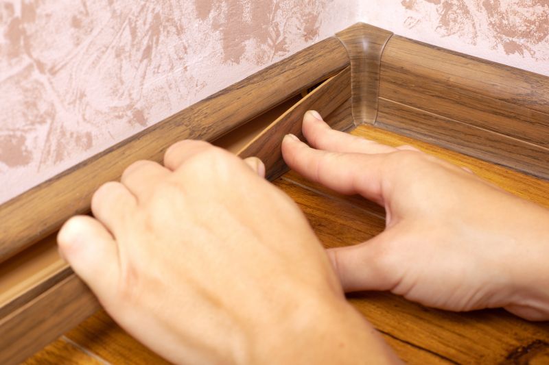 Applying adhesive and hanging wallpaper